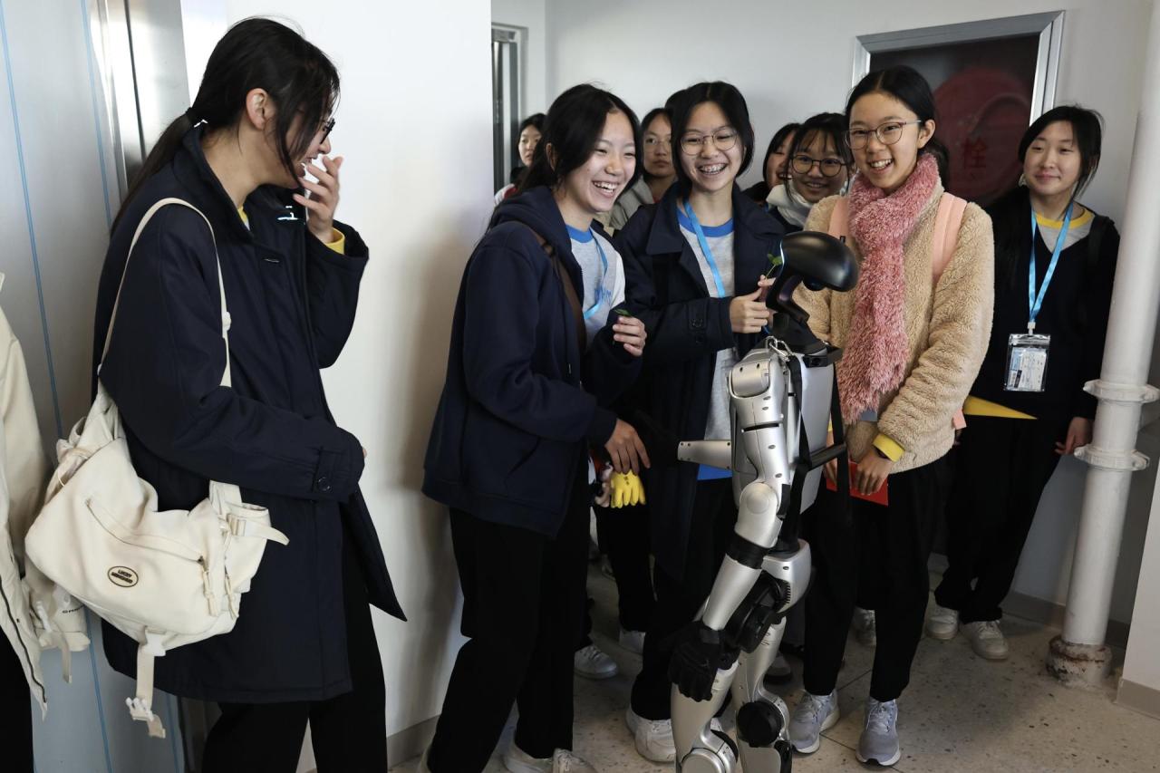 Interacting with robots during the lesson.
